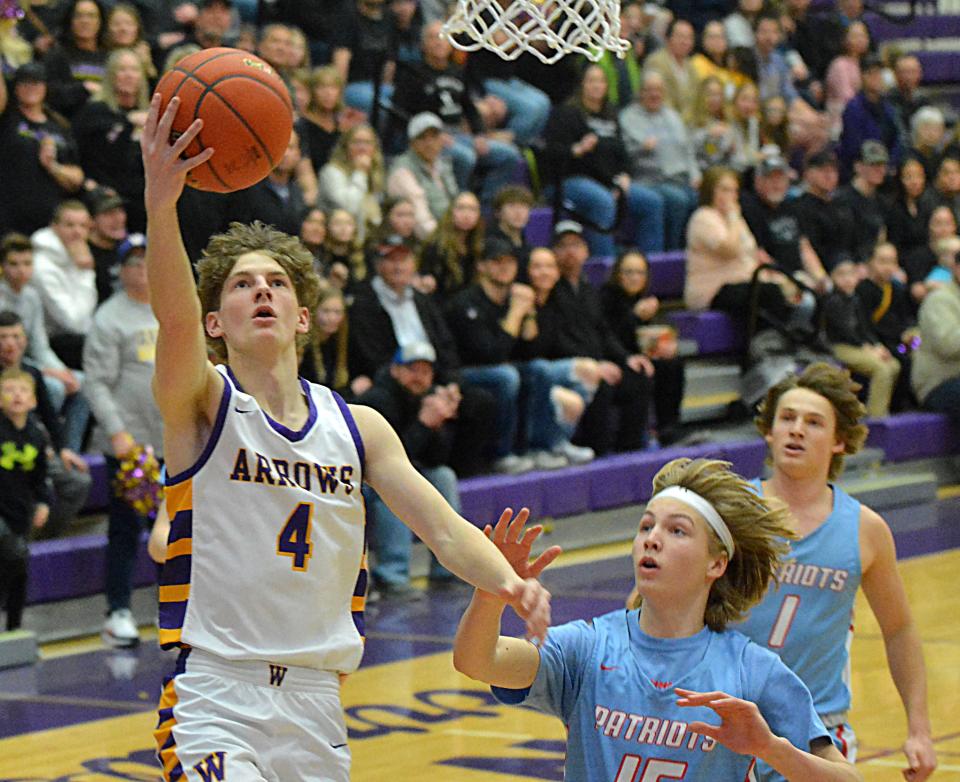 Watertown's Dylon Rawdon goes in for a layp against Sioux Falls Lincoln's Sam DeGroot during their Class AA SoDak 16 state-qualifying boys basketball game on Saturday, March 2, 2024 in the Watertown Civic Arena. Watertown won 31-28.