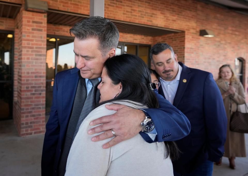 State Sen. Roland Gutierrez, D-San Antonio, hugs Gloria Cazares, mother of slain student Jackie Cazares, after Thursday's news conference by U.S. Attorney General Merrick Garland about the Uvalde school shooting.