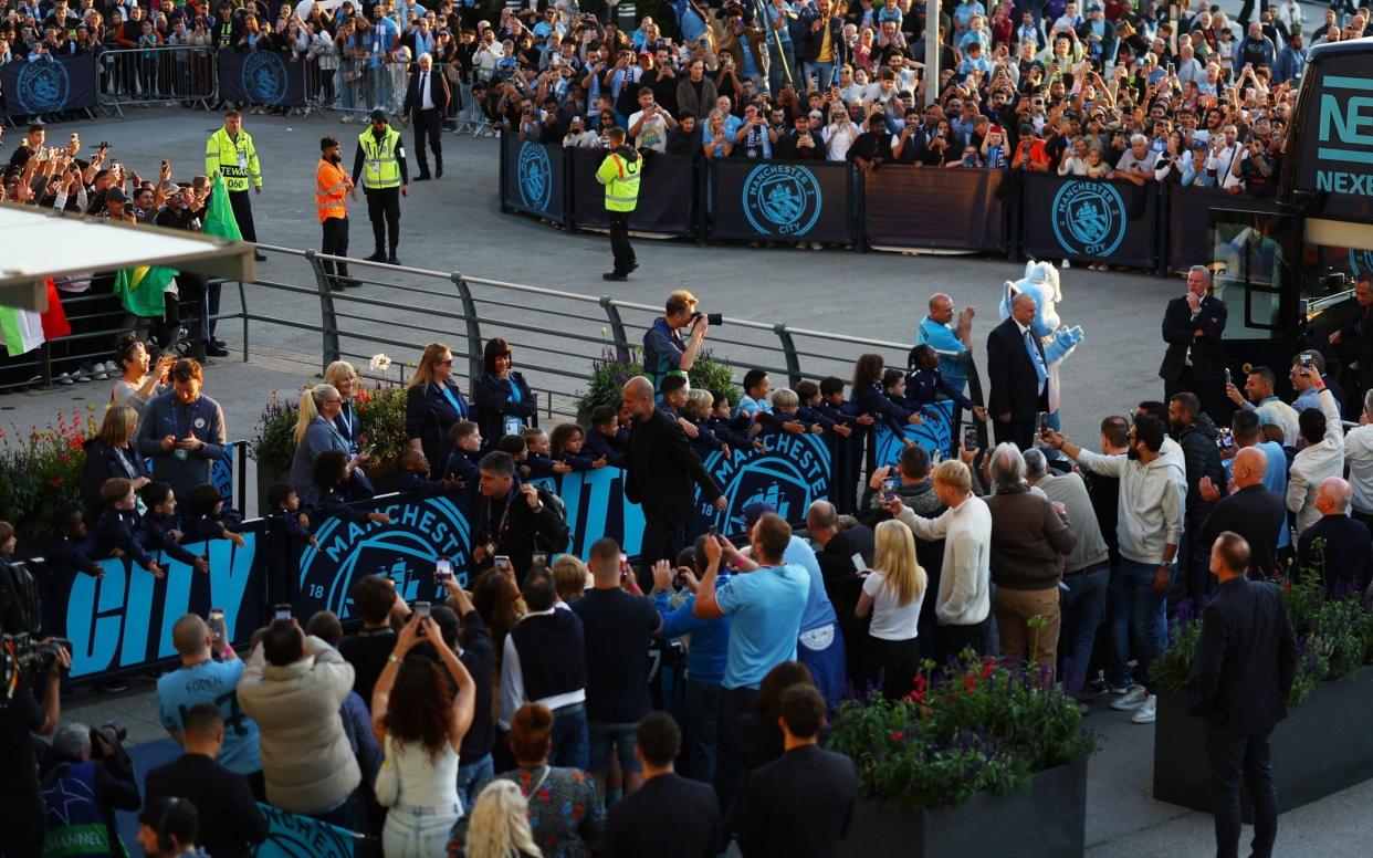 Manchester City manager Pep Guardiola arrives outside the stadium before the match