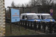 Ambulances parked at the coal mine, in Karaganda, Kazakhstan, Saturday, Oct. 28, 2023. A coal mine fire in central Kazakhstan has killed at least 21 workers while another 25 remained unaccounted for, the operating company ArcelorMittal Temirtau said in a statement. ArcelorMittal Temirtau is the local representative for Luxembourg-based multinational ArcelorMittal, the world's second-largest steel producer. (AP Photo)