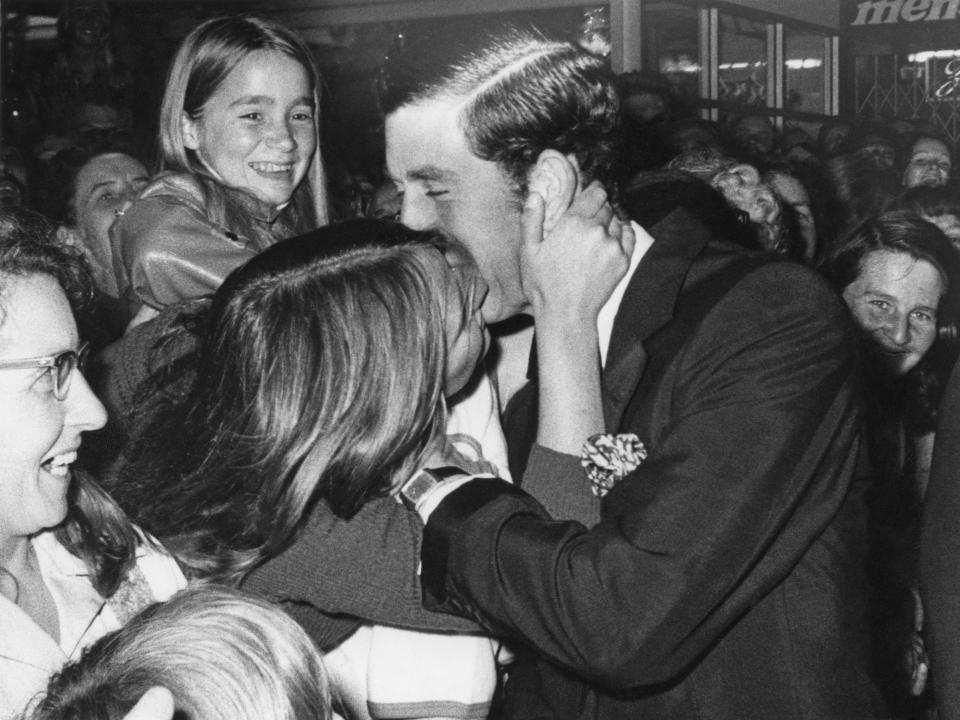 prince charles kisses gilda larbey in 1977