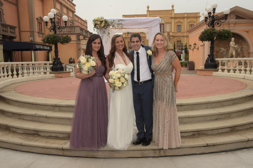 My sister was my only bridesmaid, so we saved a bit of money on flowers by needing only two bouquets and arrangements for the receptions. (Photo: Rick Diamond)