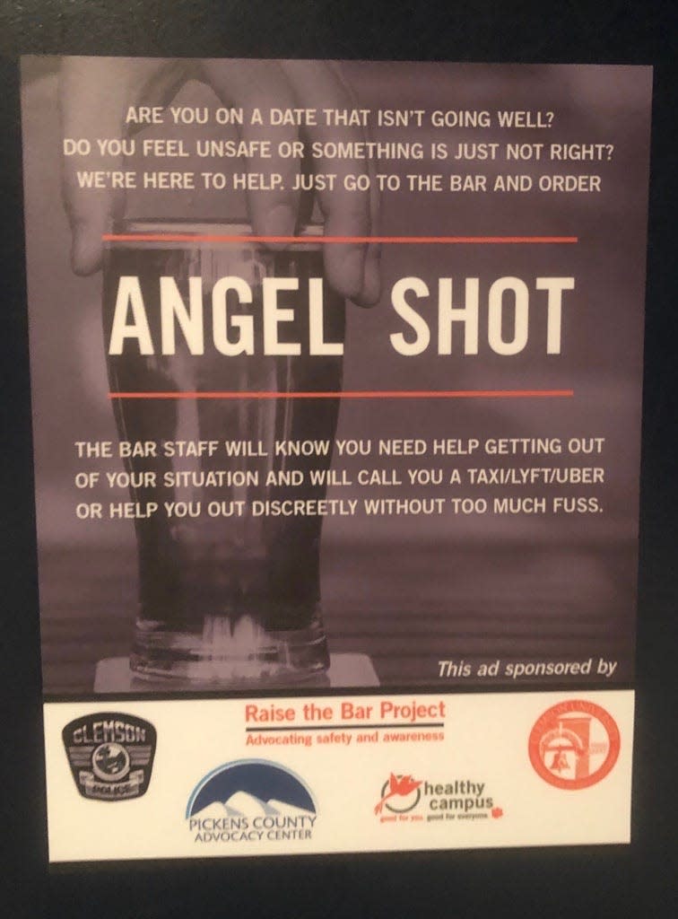Angel Shot posters are displayed in all women's restrooms in downtown Clemson, S.C., bars and restaurants. If a customer feels unsafe, they can order an "Angel Shot," and the bar's staff will get them home safely.