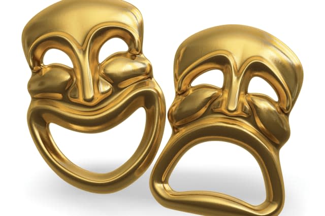 A 3d rendering of the classic comedy-tragedy theater masks isolated on white with a clipping path