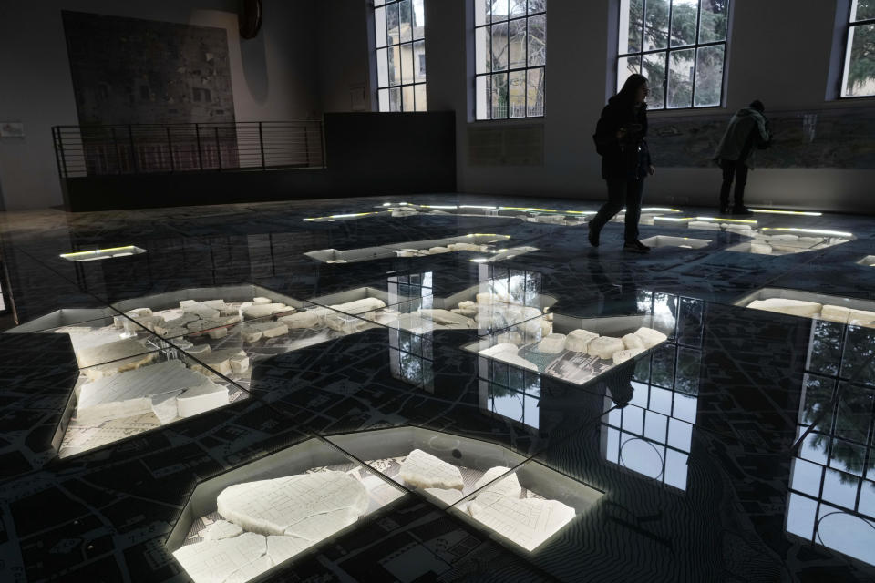 The giant marble map (Forma Urbis Romae) of the ancient Rome is shown to the media in the Archaeological Park of Mount Celio Museum overlooking the Colosseum in Rome, Thursday, Jan. 11, 2024. The giant map of Rome was done under Emperor Septimius Severus in 203 A.D. The map is 18 meters by 13 meters. (AP Photo/Gregorio Borgia)