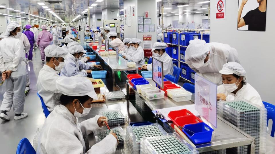 <div class="inline-image__caption"><p>Employees work at RELX e-cigarette factory of Shenzhen Wuxin Technology Co Ltd on Sept. 23, 2021, in Shenzhen, China.</p></div> <div class="inline-image__credit">VCG via Getty</div>