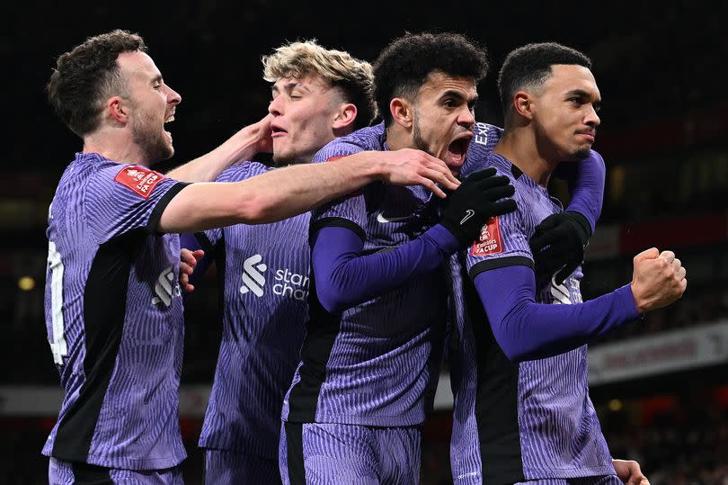 Diogo Jota, Bobby Clark, Luis Diaz and Trent Alexander-Arnold of Liverpool celebrate after the opening own goal scored by Jakuba Kiwior of Arsenal during the FA Cup third round match against Arsenal at Emirates Stadium on January 7 2024