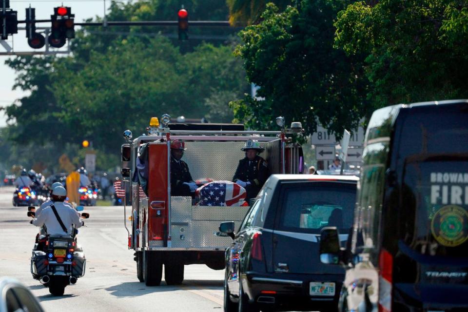 The funeral procession for Broward Sheriff Fire Rescue Battalion Chief Terryson Jackson leaves the L.C. Poitier Funeral Home in Pompano Beach on Friday, Sept. 8, 2023. Jackson died in a helicopter crash on Monday, Aug. 28, when he and two BSFR colleagues were returning to the airport after responding to an emergency call. (Amy Beth Bennett / South Florida Sun Sentinel)