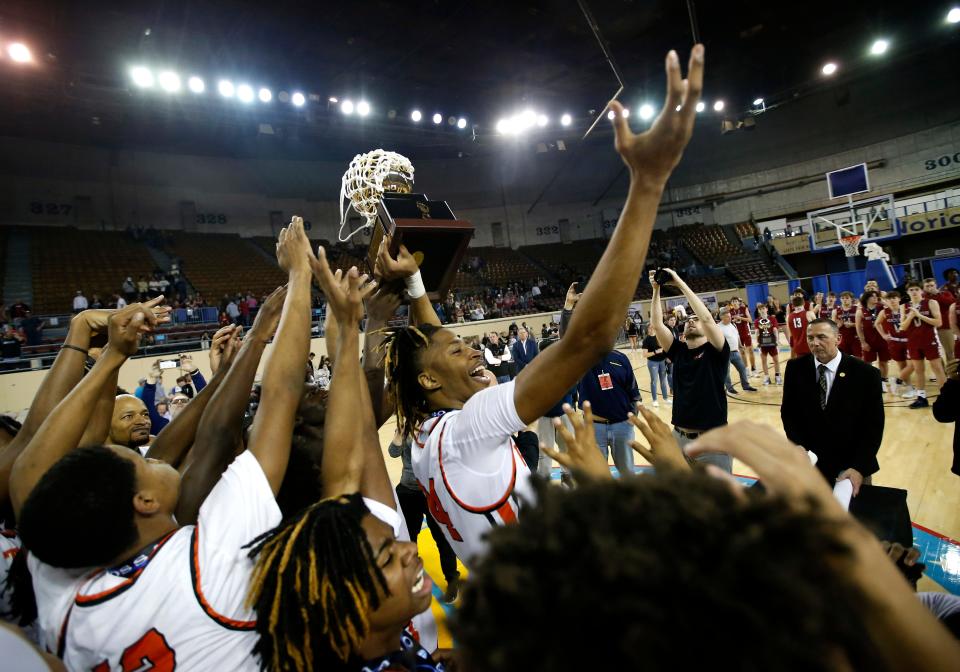 Douglass celebrates after beating Weatherford 48-44 for the Class 4A state championship on Saturday. It’s Douglass’ 11th state championship and first since 2017.
