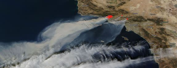 NASA satellite shows smoke plumes and heat signatures (red dots) from the wildfires burning in the Los Angeles area on Dec. 5, 2017