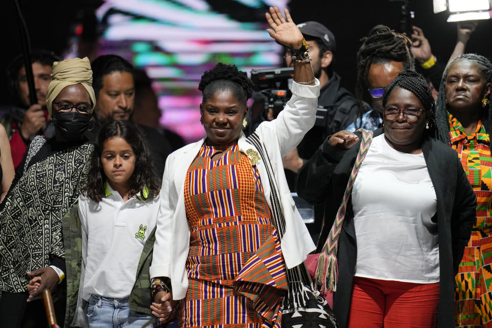 Francia Marquez, the running mate of former rebel Gustavo Petro, celebrates before supporters after they won a runoff presidential election in Bogota, Colombia, Sunday, June 19, 2022. (AP Photo/Fernando Vergara)