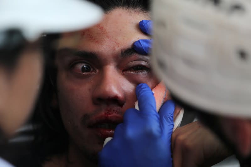 The Wider Image: Human rights abuse accusations proliferate in Chile unrest