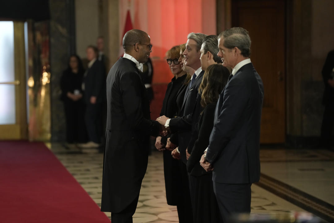 House Speaker Greg Fergus talks with members of the Mulroney family as former prime minister Brian Mulroney lies in state in the Sir John A. Macdonald building opposite Parliament Hill in Ottawa on Tuesday, March 19, 2024.THE CANADIAN PRESS/Adrian Wyld