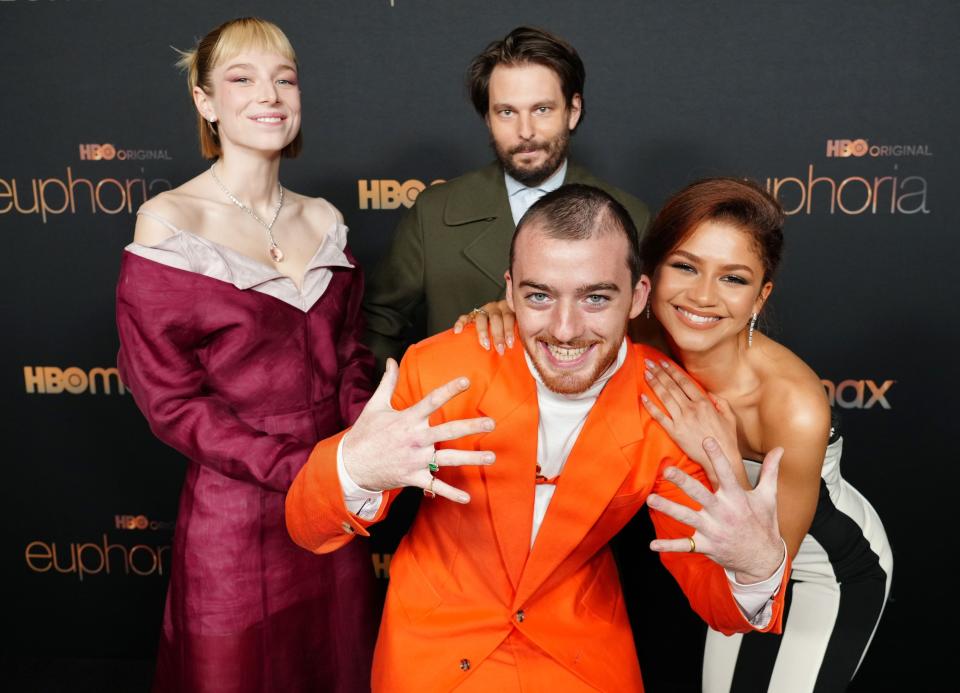 Four cast members from Euphoria posing together at an event, dressed in semi-formal attire