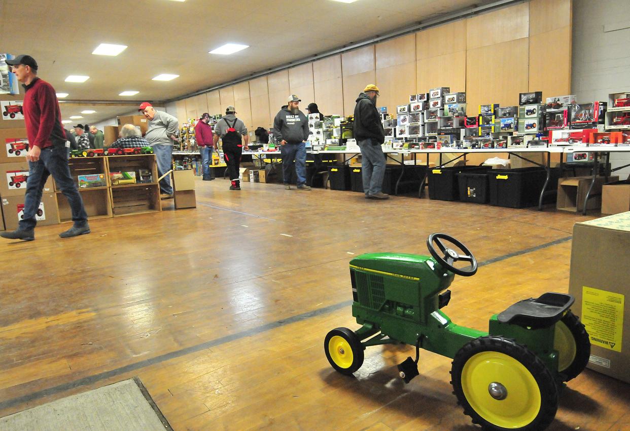 Shoppers from Ashland County and beyond filled Mozelle Hall at the Ashland County Fairgrounds Sunday to do some shopping for themselves and fellow farm toy collectors.