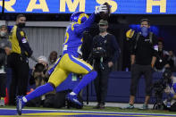 Los Angeles Rams defensive back David Long Jr. celebrates after scoring on an interception return during the first half of an NFL wild-card playoff football game against the Arizona Cardinals in Inglewood, Calif., Monday, Jan. 17, 2022. (AP Photo/Mark J. Terrill)