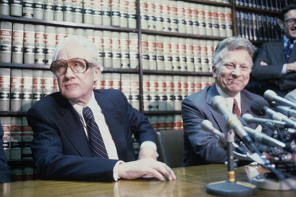 FILE - Former FBI officials, Mark Felt, left, and Edward S. Miller, appear at a news conference, April 15, 1981, after learning that President Reagan had pardoned them from their conviction of unauthorized break-ins during the Nixon administration's search for opponents during the Vietnam War. Felt revealed himself as "Deep Throat" 30 years after he tipped off Washington Post reporters Bob Woodward and Carl Bernstein in the Watergate investigation and the wrongdoing by President Richard Nixon and his allies. (AP Photo/Bob Daugherty, File)
