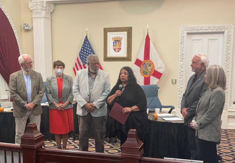 Lincolnville Museum and Cultural Center leaders Gayle Phillips and her husband, Floyd, accept the Juneteenth proclamation with mayor and commissioners at their sides at the St. Augustine City Commission meeting on Monday.