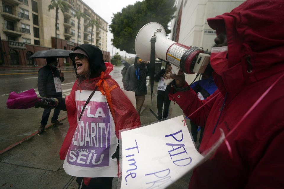 English teachers with United Teachers Los Angeles (UTLA) join the Los Angeles Unified School District, LAUSD teachers and Service Employees International Union 99 (SEIU) members picketing outside the Evans Community Adult School in Los Angeles, Tuesday, March 21, 2023. Tens of thousands of workers in the Los Angeles Unified School District walked off the job Tuesday over stalled contract talks, and they were joined by teachers in a three-day strike that shut down the nation’s second-largest school system. (AP Photo/Damian Dovarganes)