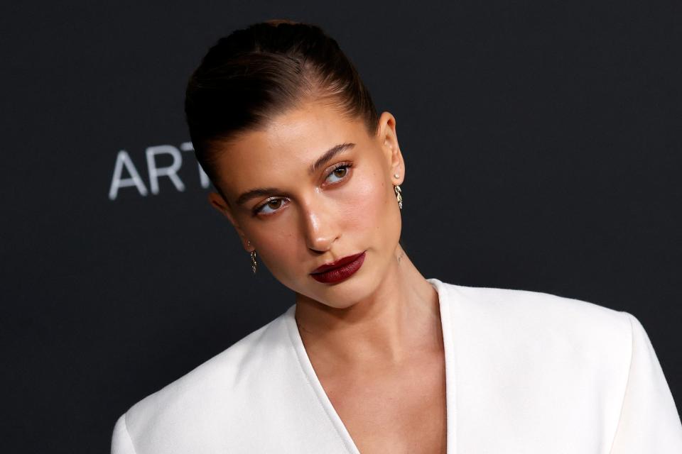 Hailey Bieber shared she is recovering after doctors discovered a small blood clot in her brain. (Photo: Michael Tran / AFP) (Photo by MICHAEL TRAN/AFP via Getty Images)