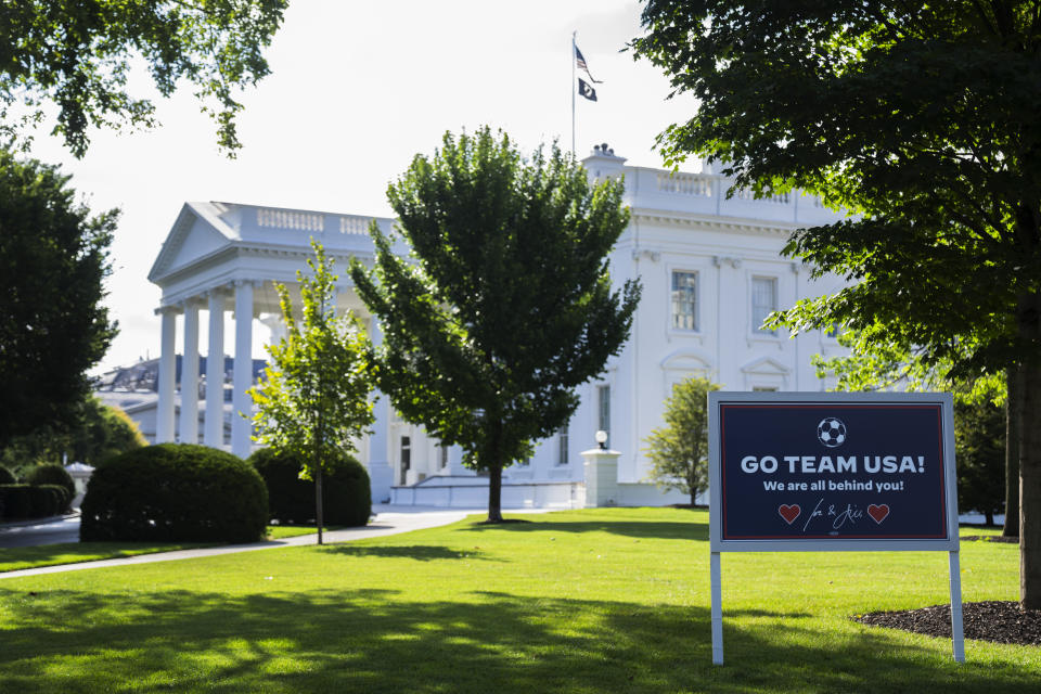 A sign is erected on the North Lawn of the White House to convey President Joe Biden and first lady Jill Biden's message of support for Team USA ahead of their first match in the 2023 Women's World Cup, Friday, July 21, 2023. (AP Photo/Manuel Balce Ceneta)