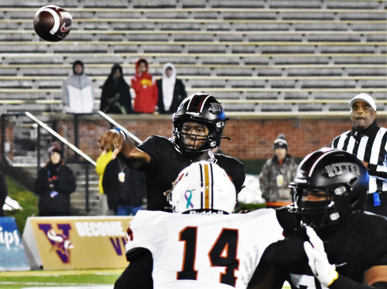 Cardinal Ritter quarterback Carson Boyd fires a pass over the Republic pass rush during the MSHSAA Class 5 State Championship Game at Faurot Field on Dec. 1, 2023, in Columbia, Mo.