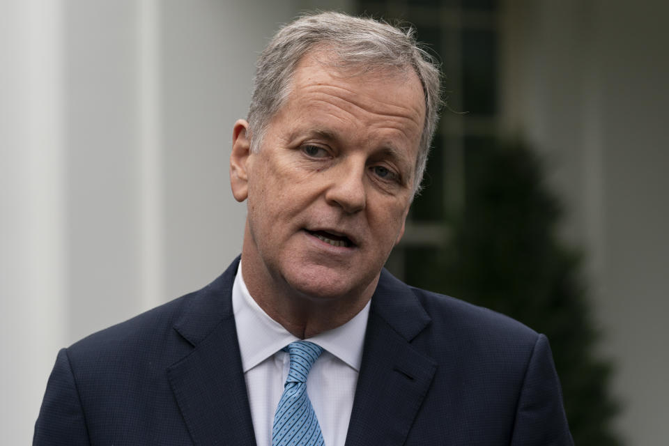 FILE - Doug Parker, CEO of American Airlines, speaks with reporters after a meeting with White House Chief of Staff Mark Meadows at the White House, Thursday, Sept. 17, 2020, in Washington. American Airlines CEO Doug Parker will retire next March and be replaced by the airline's current president, Robert Isom. American said Tuesday, Dec. 7, 2021, that Parker will remain chairman. (AP Photo/Alex Brandon, File)