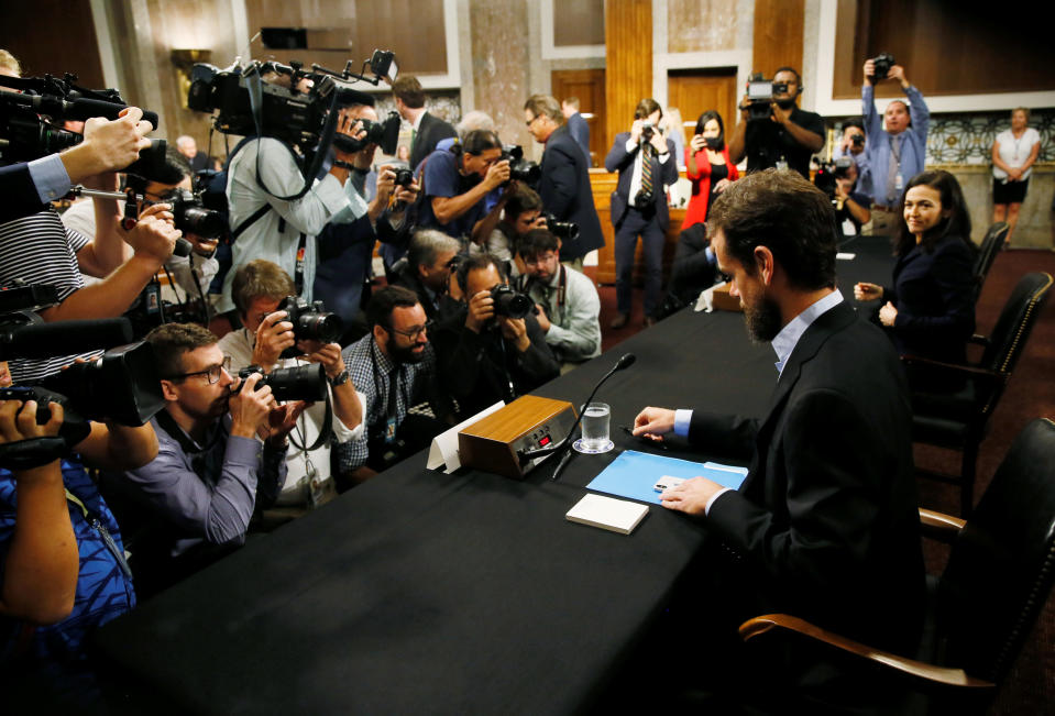 Twitter CEO Jack Dorsey and Facebook COO Sheryl Sandberg are seated to testify before a Senate Intelligence Committee hearing on foreign influence operations on social media platforms on Capitol Hill in Washington, U.S., September 5, 2018. REUTERS/Jim Bourg