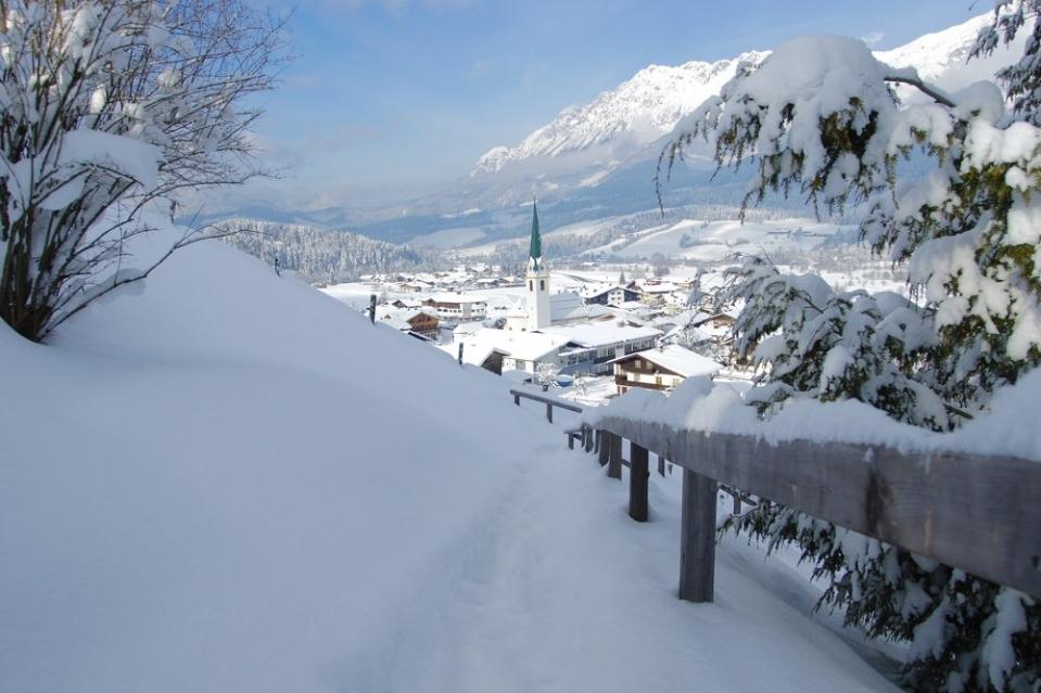 view down a snowy mountain