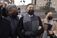 Actor Jussie Smollett, center, departs Tuesday, Dec. 7, 2021, with his mother Janet, left, and an unidentified sister the Leighton Criminal Courthouse after day six of his trial in Chicago. Closing arguments will begin Wednesday, in Chicago. (AP Photo/Charles Rex Arbogast)