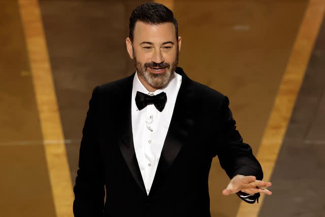 <p>Kevin Winter/Getty</p> Jimmy Kimmel hosting the Oscars in Hollywood, California, on March 12, 2023