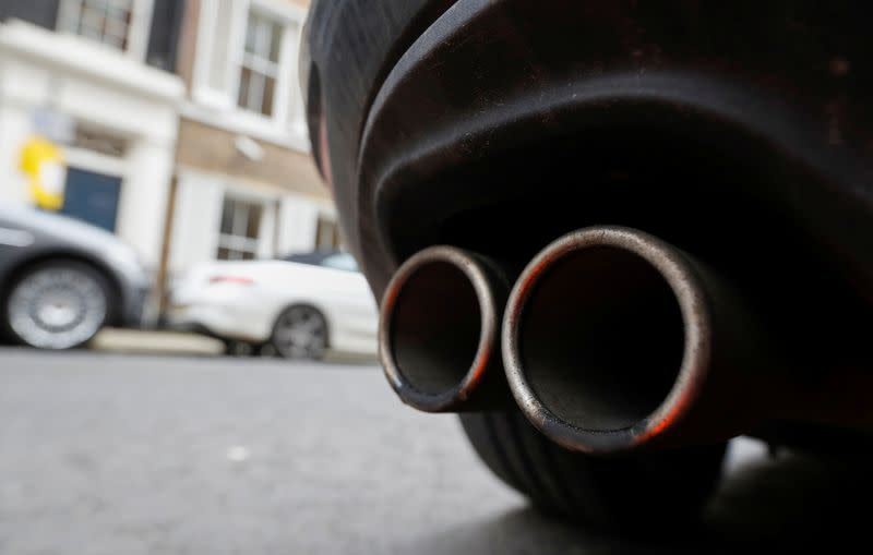 Exhaust pipes of a car are pictured in London