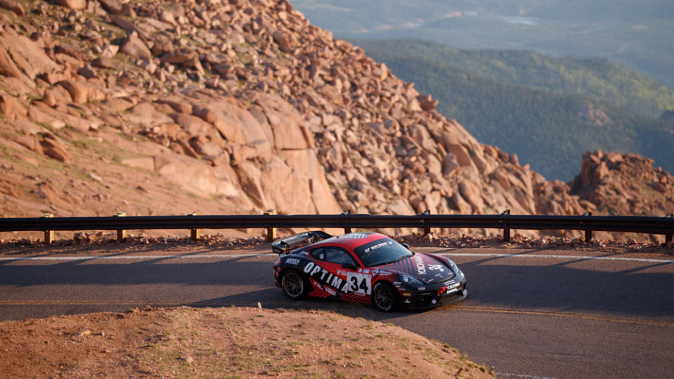 BBi Autosport’s Tanner Foust training on the 12.42-mile course up Pikes Peak. - Credit: Photo by Larry Chen, courtesy of BBi Autosport.