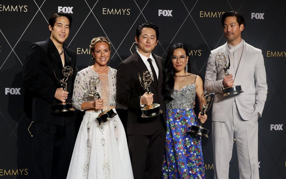 Young Mazino, Maria Bello, Steven Yeun, Ali Wong, and Joseph Lee hold awards as they pose together
