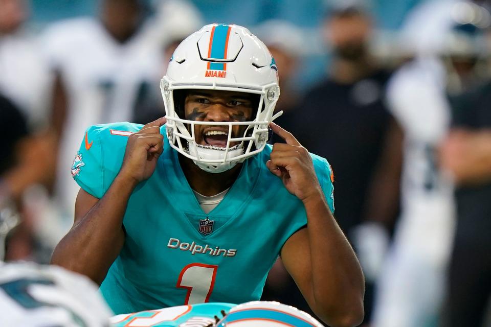 Miami Dolphins quarterback Tua Tagovailoa (1) calls out a play during the first half of a NFL preseason football game against the Philadelphia Eagles, Saturday, Aug. 27, 2022, in Miami Gardens, Fla.