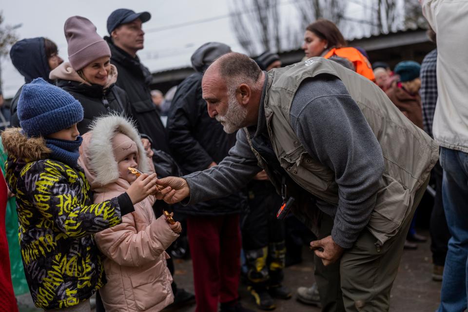 Spanish-American chef Jose Andres, founder of World Central Kitchen, gives food to residents in Kherson, in southern Ukraine, on Thursday, Nov. 17, 2022.