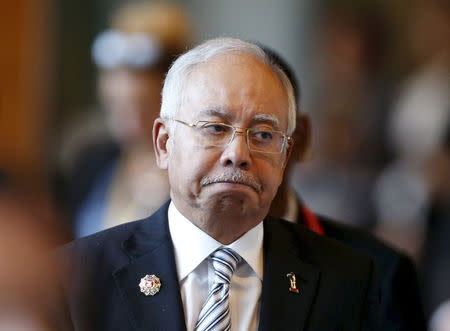 Malaysia's Prime Minister Najib Razak arrives at a session of the 27th Association of Southeast Asian Nations (ASEAN) Summit in Kuala Lumpur, in this November 21, 2015 file photo. REUTERS/Olivia Harris/Files