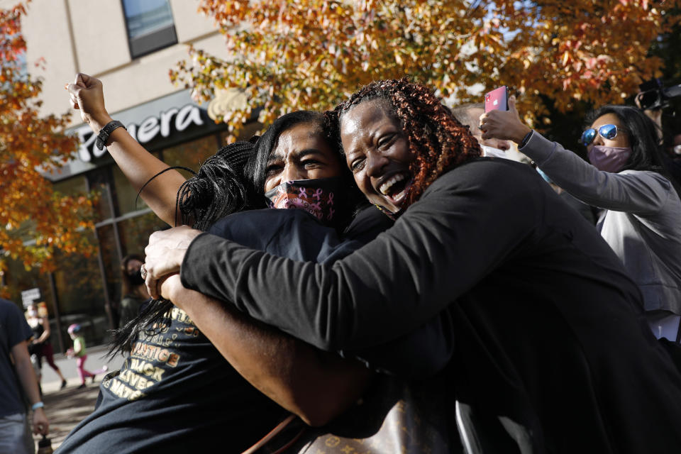 People celebrate Saturday, Nov. 7, 2020, in Philadelphia, after Democrat Joe Biden defeated President Donald Trump to become 46th president of the United States. (AP Photo/Rebecca Blackwell)