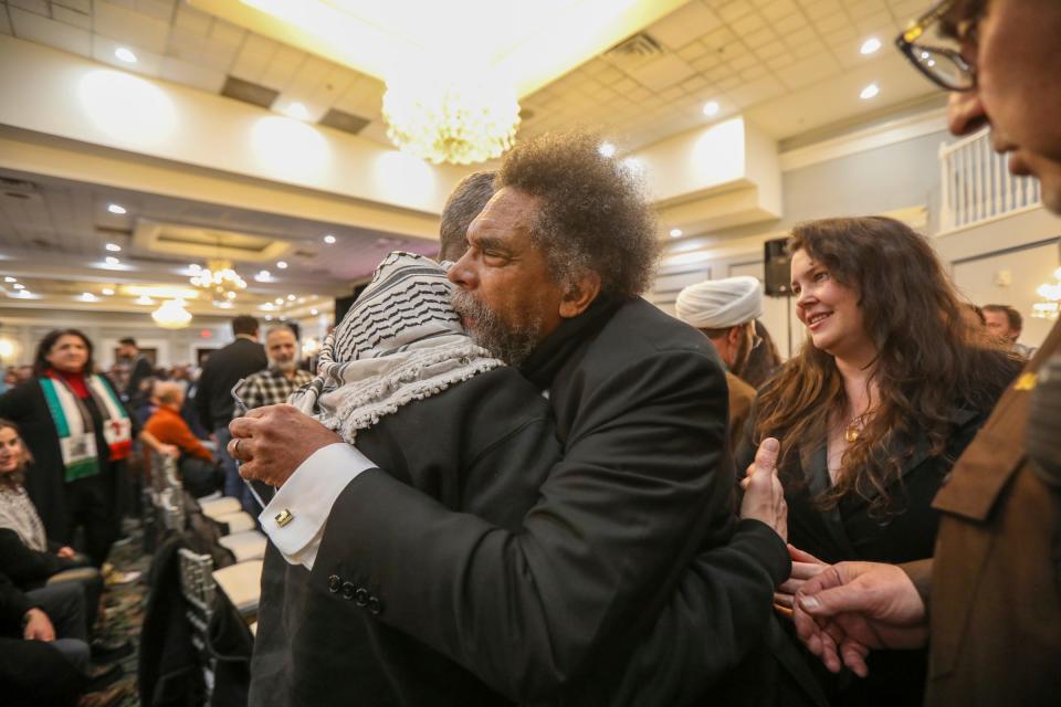 Cornel West, a U.S. presidential candidate, hugs members of the audience after speaking at a pro-Palestinian interfaith event called "Gaza Endures" at Greenfield Manor in Dearborn, Mich. on Tuesday, Dec. 19, 2023.