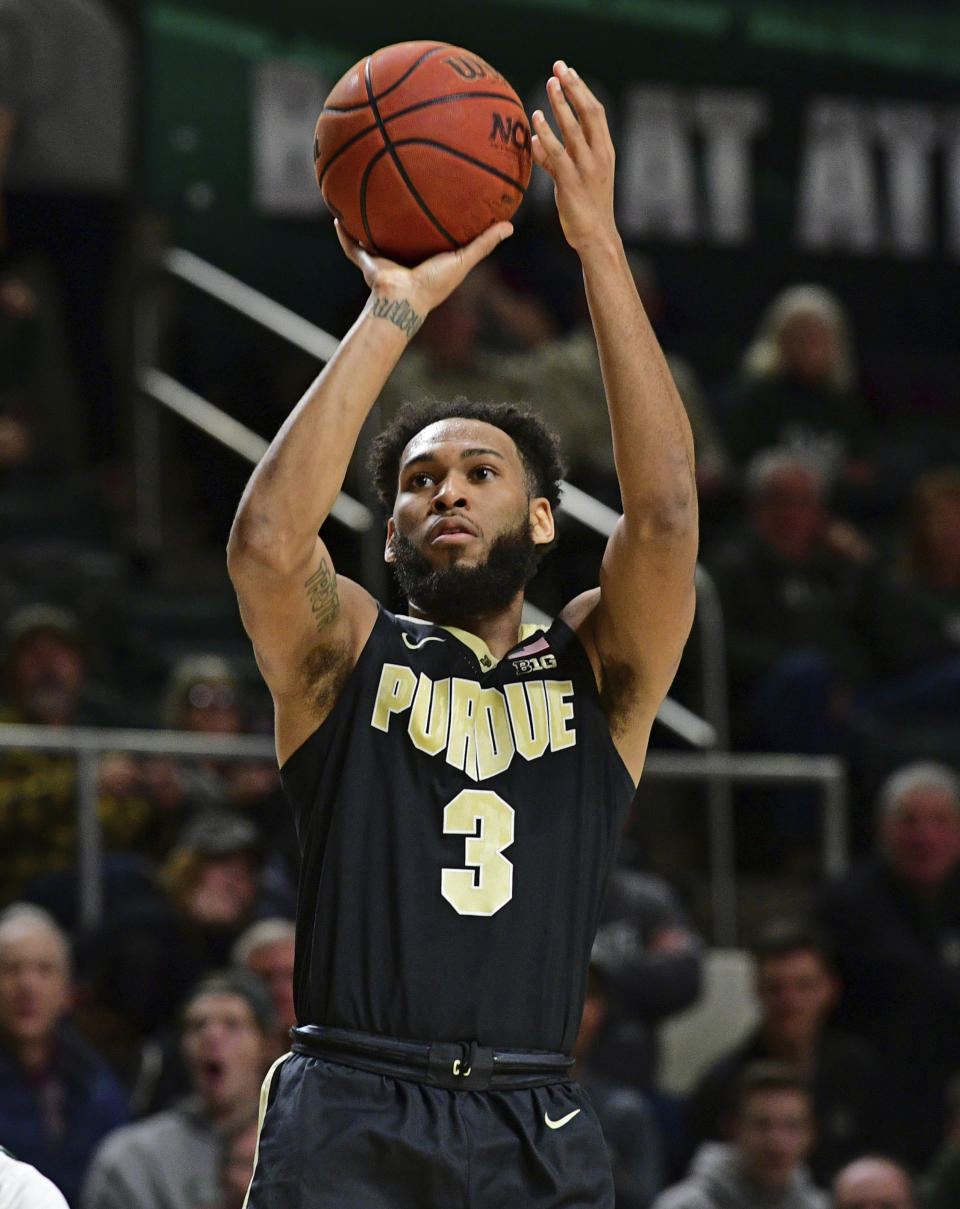 Purdue's Jahaad Proctor shoots during the first half of an NCAA college basketball game against Ohio, Tuesday, Dec. 17, 2019, in Athens, Ohio. (AP Photo/David Dermer)