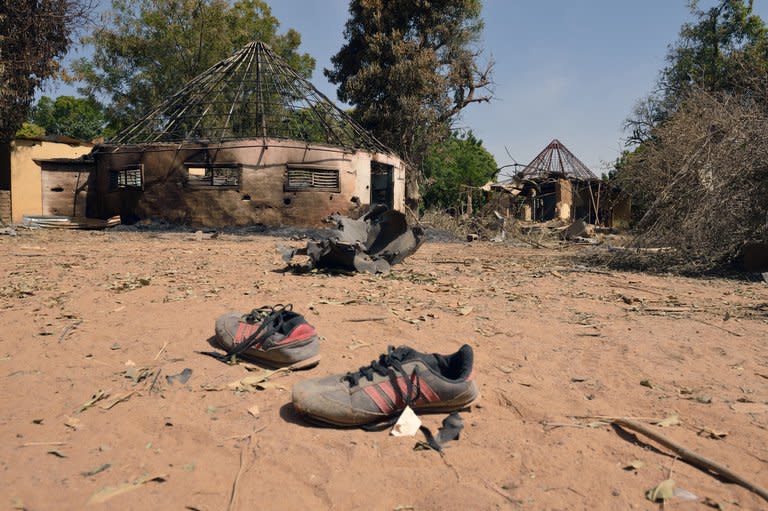 Shoes are seen in a Malian barracks that was occupied by Islamists in Diabaly, 400km north of Bamako, before a French air strike destroyed it, on January 23, 2013. One of the main Islamist groups in Mali split Thursday, with the breakaway faction saying it was ready for talks to end a two-week-old French-led offensive, amid mounting concerns over rights abuses by government troops