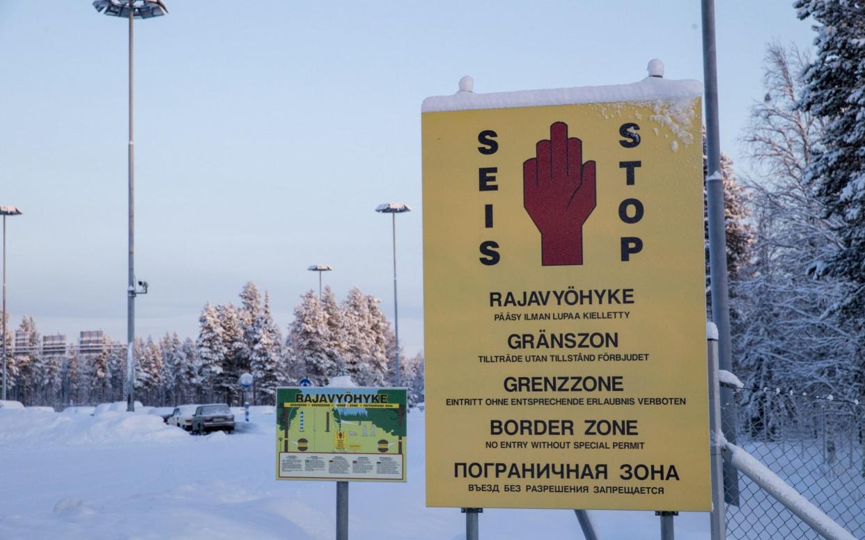 The man set up a bogus version of the real Finnish Russian border post, pictured here, to convince the migrants to pay him more than 10,000 euros to smuggle them to Europe - Lehtikuva