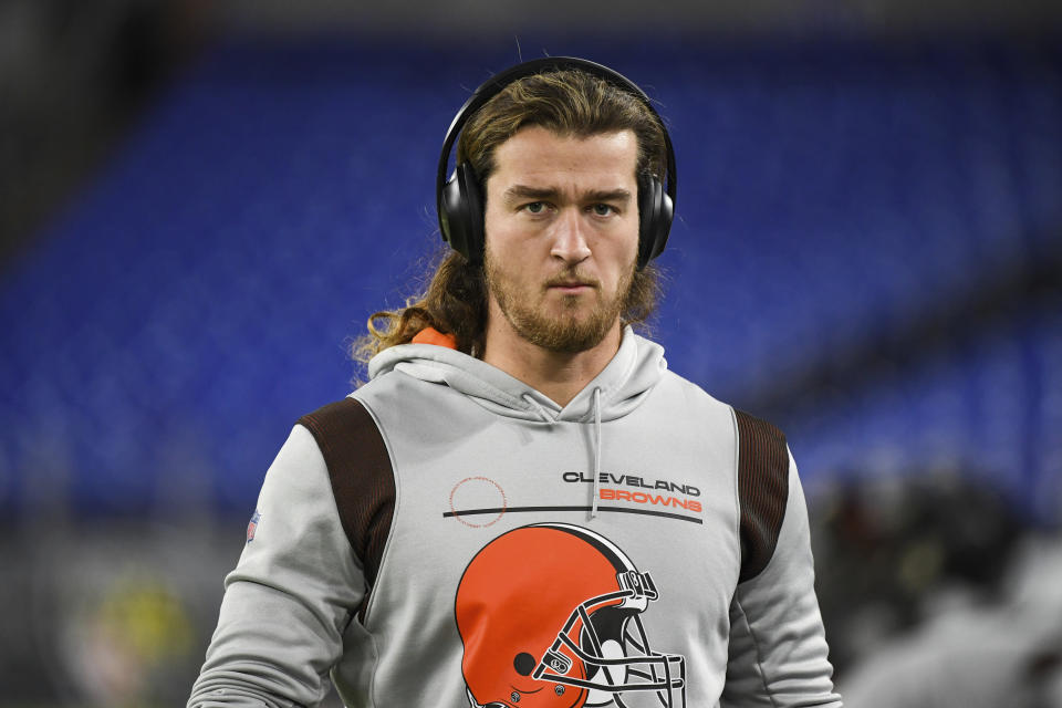 FILE - Cleveland Browns punter Jamie Gillan looks on during pre-game warm-ups before an NFL football game against the Baltimore Ravens, Sunday, Nov. 28, 2021, in Baltimore. Nicknamed the “Scottish Hammer,” Gillan was let go on Wednesday, Dec. 22, 2021 as the Browns began getting ready for Saturday's game at Green Bay while slowly getting players back from a COVID-19 outbreak. (AP Photo/Terrance Williams, File)