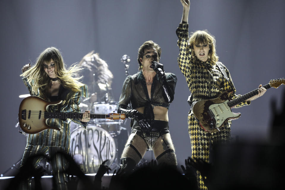 Thomas Raggi, from right, Damiano David, and Victoria De Angelis from the band Maneskin perform at the European MTV Awards in Budapest, Hungary, Sunday, Nov. 14, 2021. (Photo by Vianney Le Caer/Invision/AP)