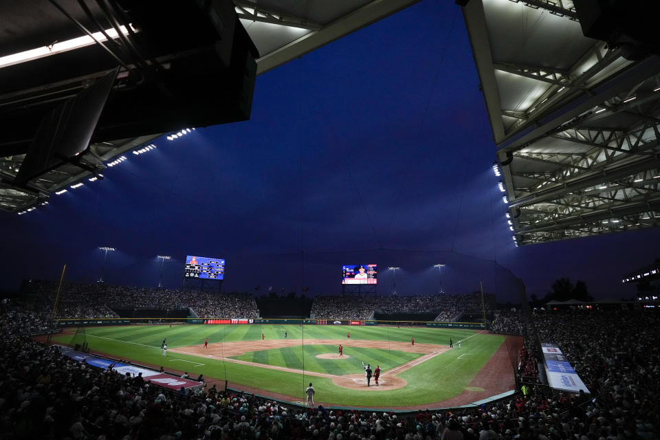 New York Yankees' Jose Trevino hits a triple against Diablos Rojos at third inning during an exhibition baseball game at Alfredo Harp Helu Stadium in Mexico City, Monday, March 25, 2024. (AP Photo/Fernando Llano)