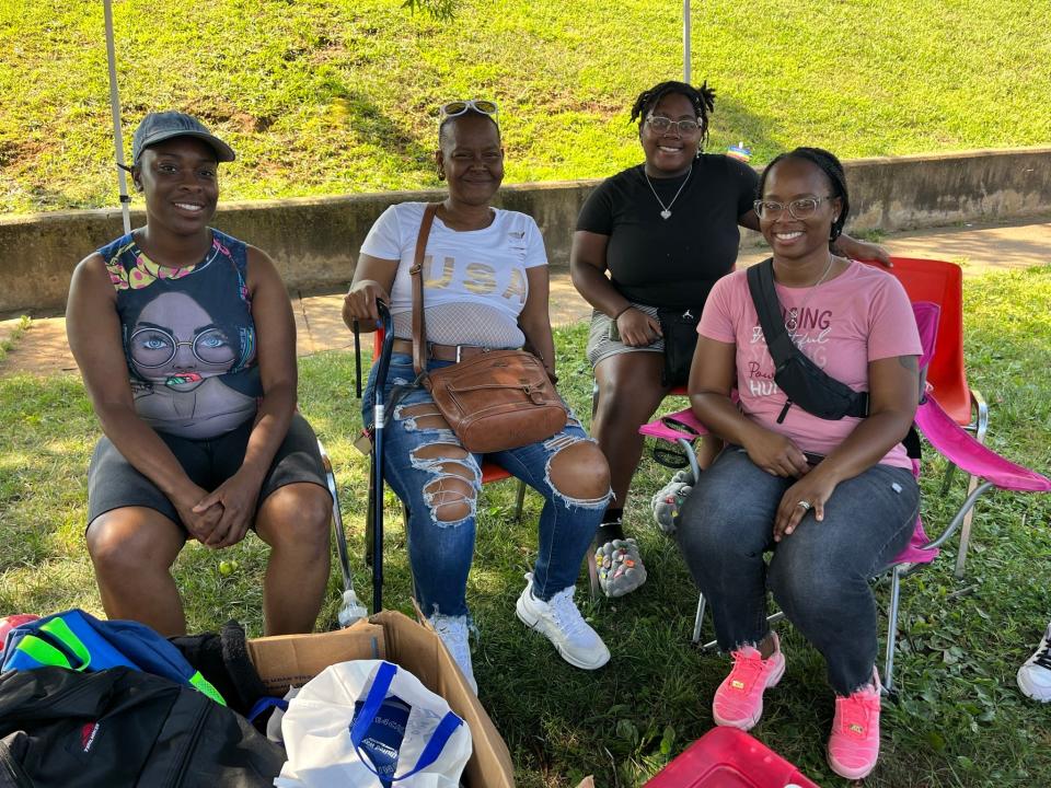 This family from the Honey Rock Victorious Church set up their own booth, where they gave away toys, clothes and shoes, at the Western Heights community’s back-to-school block party on Aug. 1, 2023.