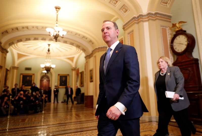 House impeachment managers enter the Senate Chamber ahead of expected final votes in the Senate impeachment trial of U.S. President Trump on Capitol Hill in Washington