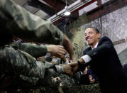 <p>President Barack Obama shakes hands with U.S. service members during his visit at Osan Air Base in Osan, outside Seoul, South Korea, Thursday, Nov. 19, 2009. (AP Photo/Pablo Martinez Monsivais) </p>