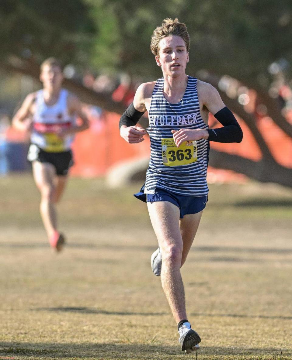 Clovis East’s Carter Spradling reaches the finish during the boys Division I state cross country championships at Woodward Park in Fresno on Saturday, Nov. 25, 2023.