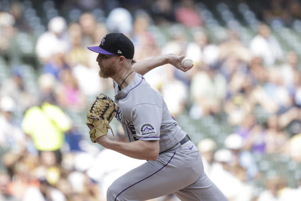 Colorado Rockies starting pitcher Jon Gray throws to the Milwaukee Brewers during the first inning of a baseball game Friday, June 25, 2021, in Milwaukee. (AP Photo/Jeffrey Phelps)